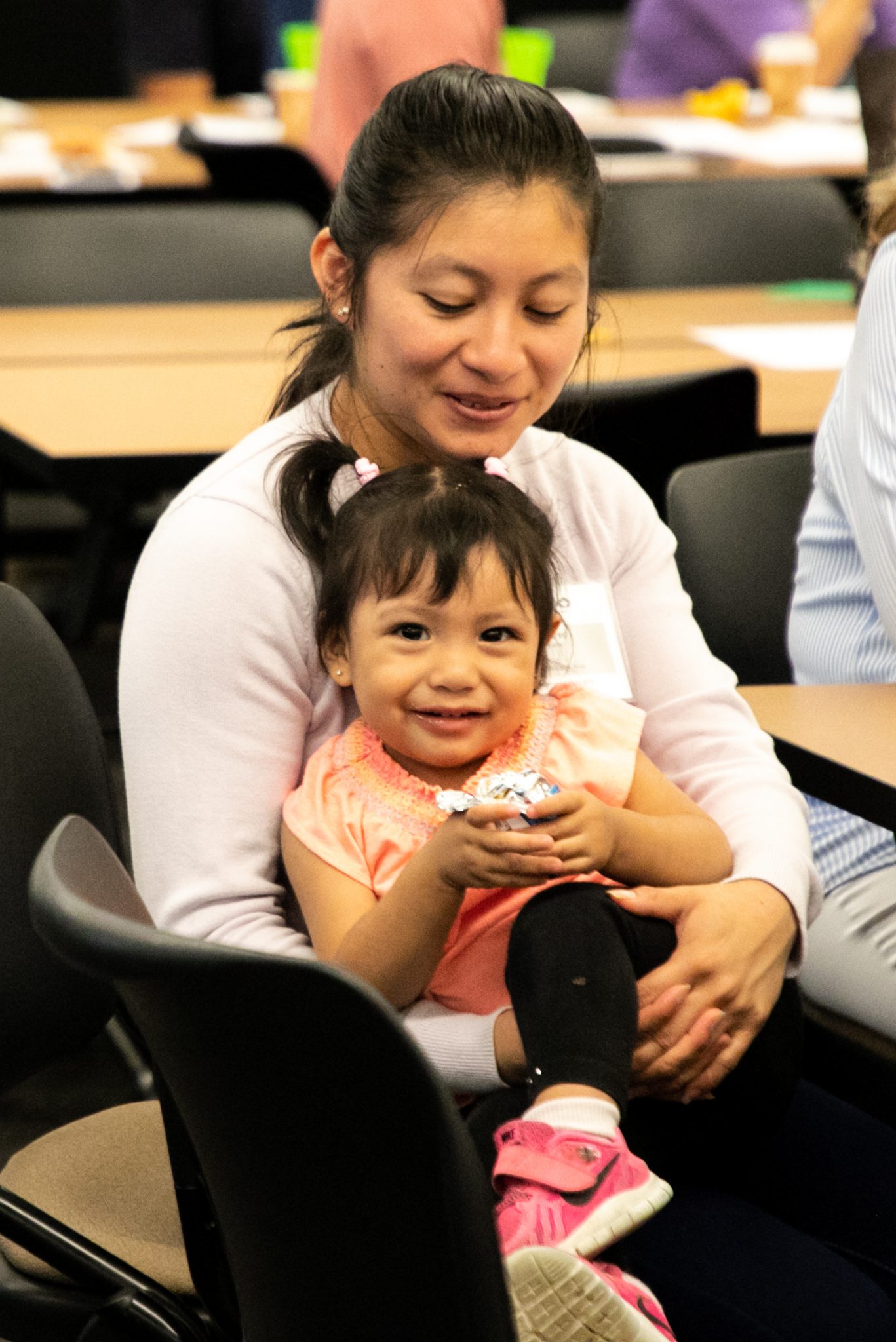 photo of child in mother's lap