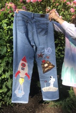 photo of pants with space themed patches