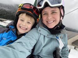 Selfie of Jenee and her child skiing