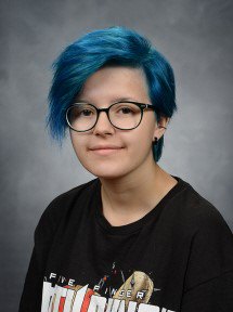 school picture of girl with blue hair and glasses